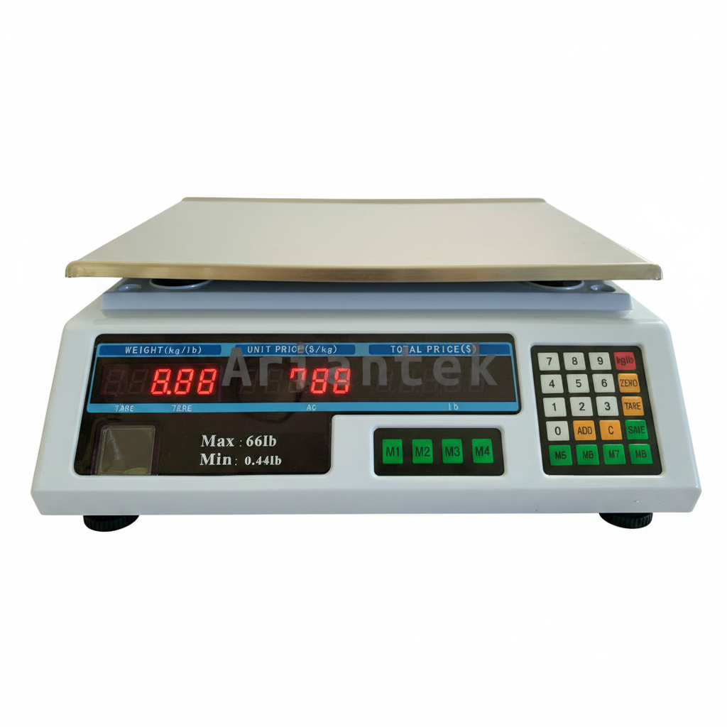 A digital scale with a light gray body and stainless steel weighing platform, shown on a desk with a yellow measuring tape below it. The scale has a blue backlit display screen and a numeric keypad on the right.